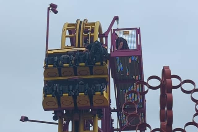 Watch Rescue of terrified riders stuck at top of UK rollercoaster